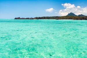 turquoise Indian ocean near the island of Mauritius, tropical nature and coral reef in Mauritius. photo