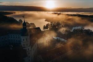 Nesvizh castle is a residential castle of the Radziwill family in Nesvizh, Belarus, with a beautiful view from above at dawn photo