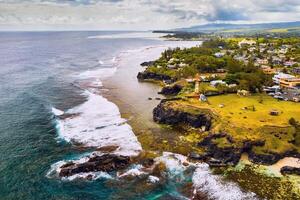 Aerial view of the cliffs of the spectacular Gris Gris Beach, in southern Mauritius. Here, is the strong waves of the Indian Ocean crashing towards the cliffs. the swimming is prohibited here. photo