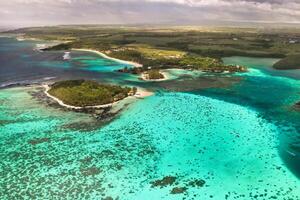 View from the height of the east coast of the island of Mauritius in the Indian Ocean. Beautiful lagoon of the island of Mauritius, photo