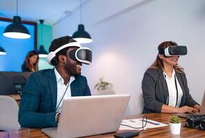 Business people wearing virtual reality glasses while working in modern creative space photo