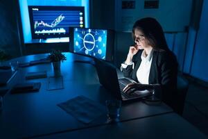 Business stock trader woman working on crypto currency markets with blockchain technology - Decentralized finance and stock exchange concept photo