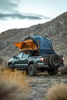 AI generated An SUV with a tent on the roof in the wild. Traveling by car photo