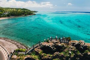 Maconde view point.Monument to captain Matthew Flinders in Mauritius. An unusual road to the Islands of Mauritius. Coral reef in the Indian ocean photo