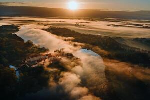 Nesvizh castle is a residential castle of the Radziwill family in Nesvizh, Belarus, with a beautiful view from above at dawn photo