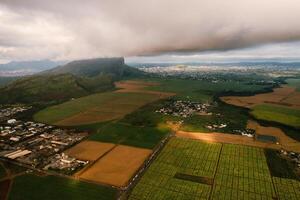 Bird's eye view of beautiful fields Islands of Mauritius and mountains photo