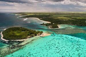 View from the height of the east coast of the island of Mauritius in the Indian Ocean. Beautiful lagoon of the island of Mauritius, photo