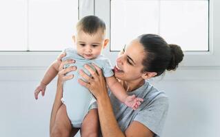 Happy mother with her little baby - Family and maternity concept photo