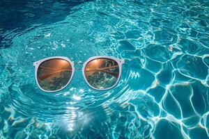 AI generated sunglasses float in the water in warm sunny weather photo