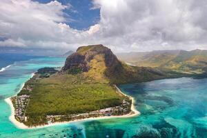 View from the height of the island of Mauritius in the Indian Ocean and the beach of Le Morne-Brabant photo