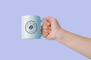 Hand holding mug logo mockup for promotional branding, with customizable background and mug color psd