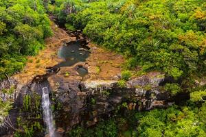 Aerial view from above of the Tamarin waterfall seven cascades in the tropical jungles of the island of Mauritius photo