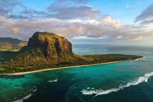 View from the height of the island of Mauritius in the Indian Ocean and the beach of Le Morne-Brabant photo