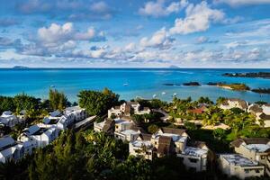 Aerial photography of a coral reef and a hotel complex with beaches in Mauritius, the North-East coast of the island of Mauritius. Beautiful lagoon of the island of Mauritius, taken from above. photo