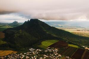 Bird's eye view of beautiful fields Islands of Mauritius and mountains photo