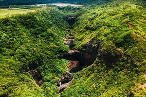 Aerial view from above of the Tamarin waterfall seven cascades in the tropical jungles of the island of Mauritius photo