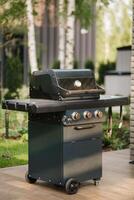 A large barbecue grill stands in the courtyard on the terrace street photo