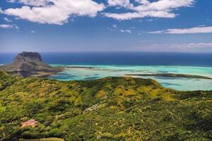 View from the height of the island of Mauritius in the Indian Ocean and the beach of Le Morne-Brabant photo