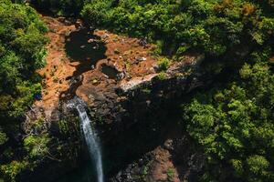 Aerial view from above of the Tamarin waterfall seven cascades in the tropical jungles of the island of Mauritius photo