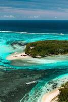 View from the height of the east coast of the island of Mauritius in the Indian Ocean. Beautiful lagoon of the island of Mauritius, photo