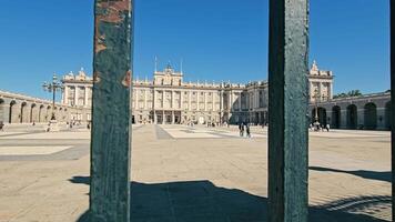 Spain, Madrid 29.11.2024 Royal Palace of Madrid, A wide-angle view of the Royal Palace of Madrid, showcasing its grand architecture and visitors enjoying the plaza. video