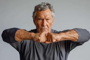 AI generated An attractive older man with a muscular build on a gray background photo