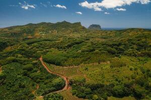 Bird's-eye view of the mountains and fields of the island of Mauritius.Landscapes Of Mauritius. photo