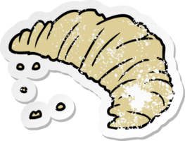 distressed sticker of a cartoon croissant png