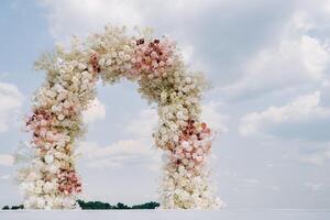 Wedding ceremony on the street on the green lawn.Decoration of a wedding celebration photo