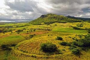 Bird's-eye view of the mountains and fields of the island of Mauritius.Landscapes Of Mauritius. photo
