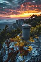 AI generated An outdoor thermos flask stands on a rock at sunset photo