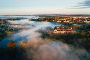 Nesvizh castle is a residential castle of the Radziwill family in Nesvizh, Belarus, with a beautiful view from above at dawn photo