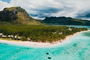 With bird's eye views of the beach and the ocean near the mountain Le Morne Brabant.Coral reef of the island of Mauritius photo