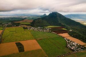Bird's eye view of beautiful fields Islands of Mauritius and mountains photo