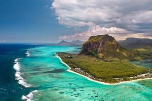 View from the height of the island of Mauritius in the Indian Ocean and the beach of Le Morne-Brabant photo