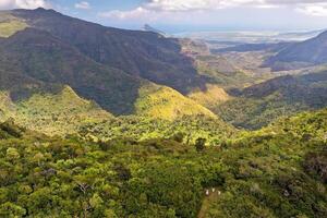 Bird's-eye view of the mountains and fields of the island of Mauritius.Landscapes Of Mauritius. photo