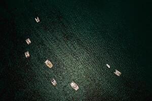 Aerial photography of the East coast of the island of Mauritius. Beautiful lagoon of the island of Mauritius, taken from above. Catamarans stand in a coral reef photo