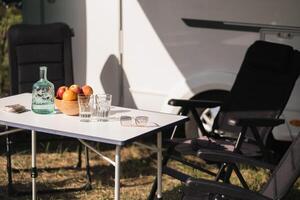 Outdoor Chairs and picnic table near the motorhome photo