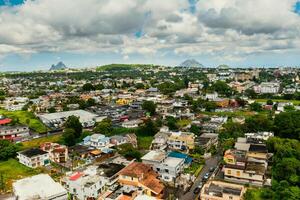 Top view of a town in the jungle of the tropical island of Mauritius, a village on the island of Mauritius photo