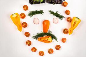 un persona s cara hecho de vegetales en un blanco antecedentes foto