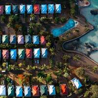 Aerial view of the cabins and pool from a bird's eye view on the island of Mauritius. photo