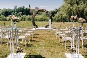 Wedding ceremony on the street on the green lawn near the Nesvizh Castle.Belarus photo