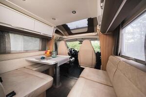 the interior of a mobile home. Salon inside the motorhome photo