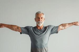 ai generado un atractivo más viejo hombre con un muscular construir en un gris antecedentes foto