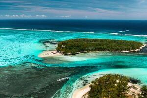 View from the height of the east coast of the island of Mauritius in the Indian Ocean. Beautiful lagoon of the island of Mauritius, photo