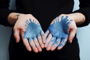 AI generated My hands are smeared with blue paint photo