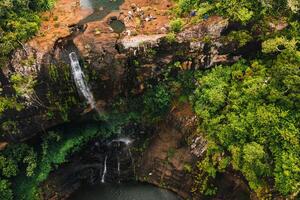 Aerial view from above of the Tamarin waterfall seven cascades in the tropical jungles of the island of Mauritius photo