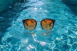 ai generado Gafas de sol flotador en el agua en calentar soleado clima foto