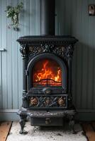 AI generated cast-iron stove in a rustic house with a fire lit inside to heat the house photo