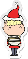 sticker cartoon of a friendly boy with books wearing santa hat png